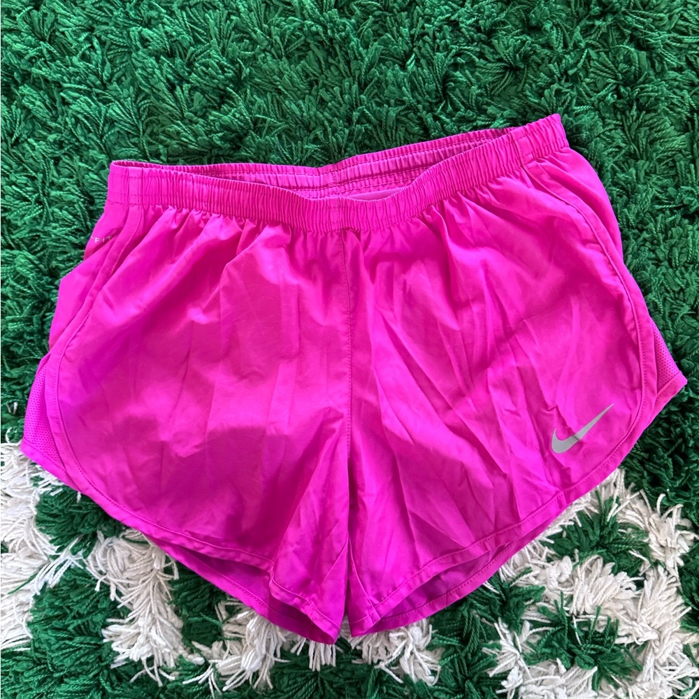 Bright pink Nike athletic shorts